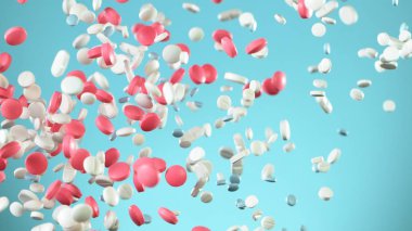 Uçan hapların beyaz arka plandaki hareketlerini dondur