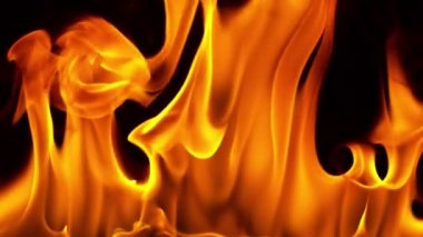 Super slow motion of flames isolated on black background in detail. Filmed on high speed camera, 1000 fps