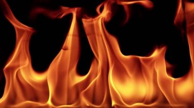 Super slow motion of flames isolated on black background in detail. Filmed on high speed camera, 1000 fps