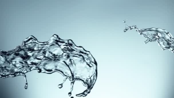 Super Slow Motion Flying Water Splash Soft Blue Background Inglês — Vídeo de Stock