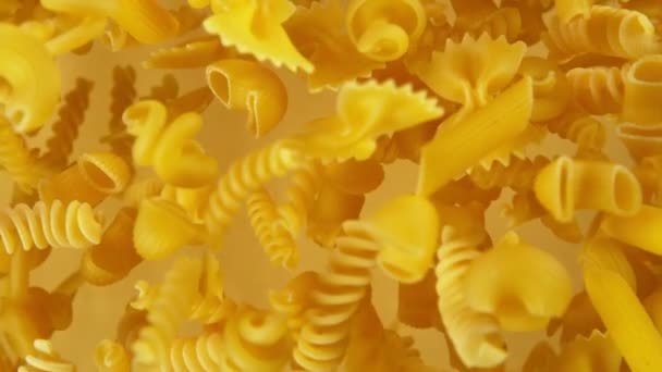 Super Slow Motion Flying Uncooked Italian Pasta Filmed High Speed — Stock Video