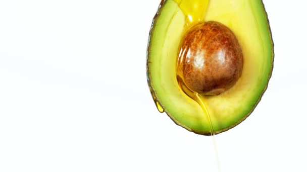 Super Slow Motion Dripping Oil Avocado Slice Filmed High Speed — Stock Video