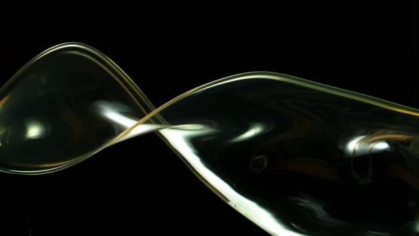 超慢运动的飞溅油旋转的黑色背景 用高速摄像机拍摄 每秒1000帧 — 图库视频影像