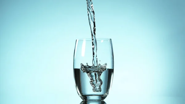 Freeze Motion Pouring Water Glass Free Space Text — Stock Photo, Image