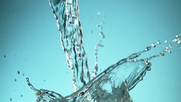 Super Slow Motion Pouring Splashing Water Blue Background Filmed High — Stock Video