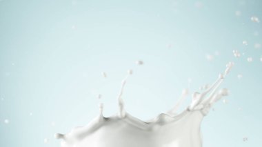 izole mavi zemin üzerine süt splash
