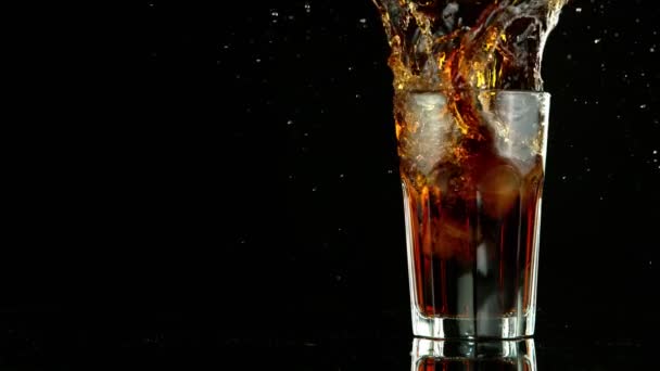 Super Slow Motion Falling Ice Cube Cola Drink Filmed High — Stock Video