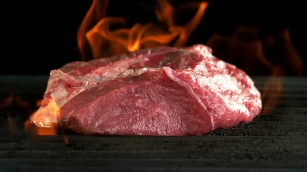 Super Slow Motion Raw Beef Steak Grill Fire Isolated Black — Stock Video