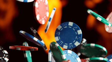 Arka planda alevler olan poker fişleri. Tehlike oyunu kavramı. Siyah arkaplanda izole