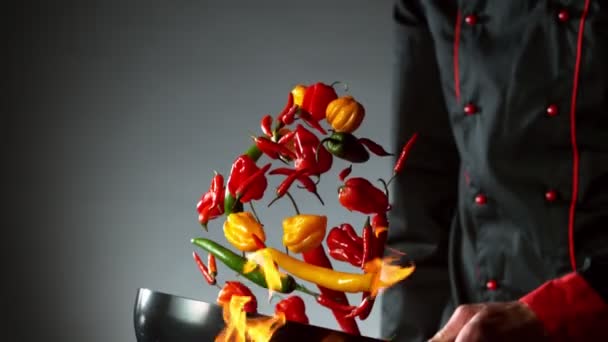 Super Slow Motion Flying Chile Peppers Wok Pan Chef Closeup — Vídeos de Stock