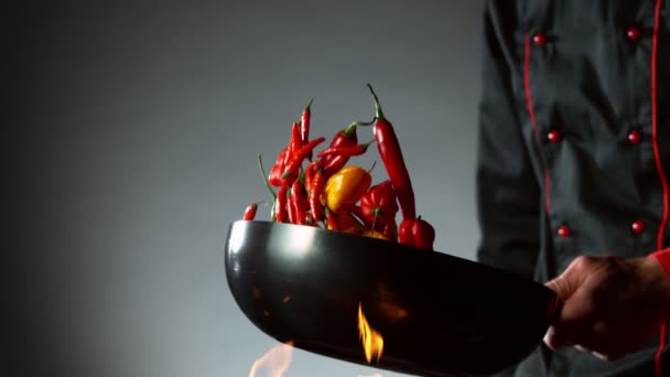 Super Slow Motion Flying Chile Peppers Wok Pan Chef Closeup — Vídeos de Stock