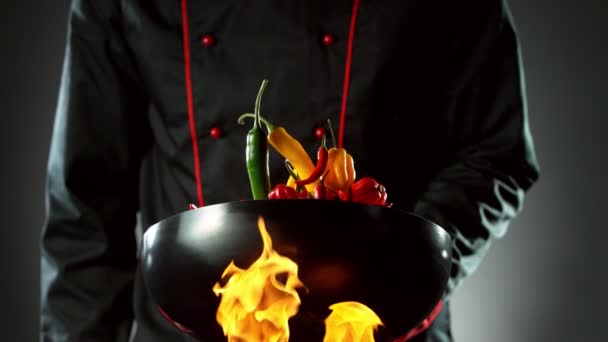 Super Slow Motion Flying Chile Peppers Wok Pan Chef Closeup — Vídeo de stock