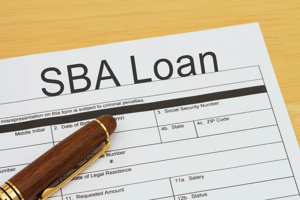 Подача заявления на получение кредита SBA — стоковое фото