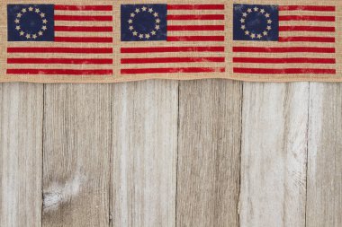 USA patriotic old flag and weathered wood background clipart