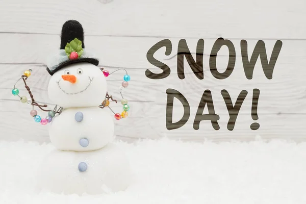 Message du jour de neige avec un bonhomme de neige — Photo