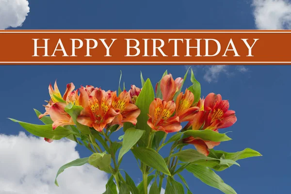 Lycklig födelsedagshälsning med en orange och gula liljor bukett — Stockfoto