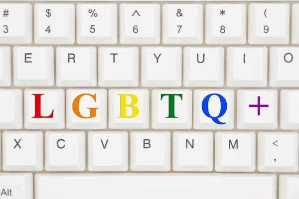 Un primer plano de un teclado con texto resaltado LGBTQ + —  Fotos de Stock