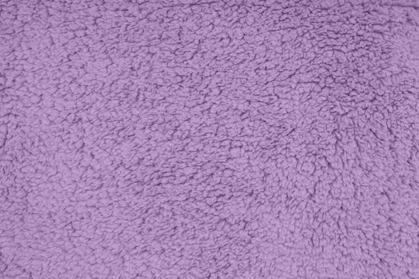 Purple sherpa textured plush fabric material background — Stock Photo, Image