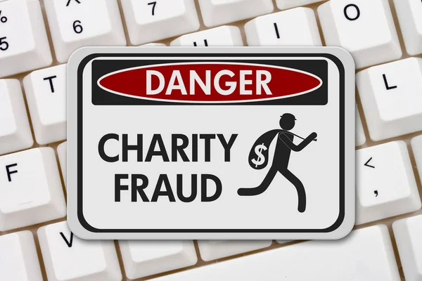 Liefdadigheid fraude gevaar teken — Stockfoto