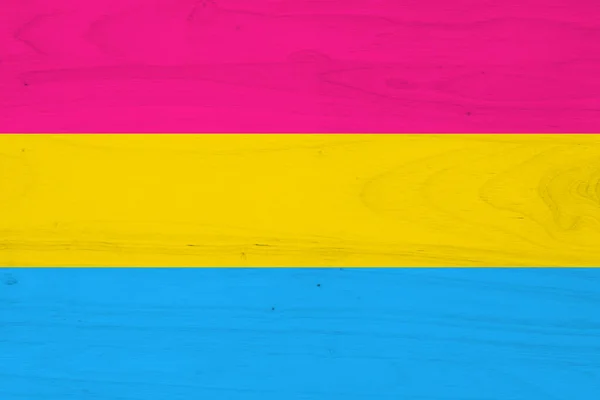 Eine Pansexuelle Flagge Mit Holzstruktur Als Hintergrund — Stockfoto