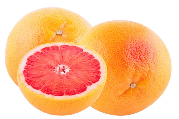 Два свежих цельных грейпфрута и полуизолированных на белом — стоковое фото