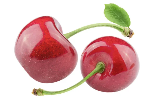 Dos frutas de cereza dulce con hoja aislada en blanco —  Fotos de Stock