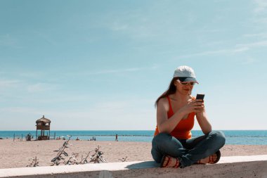 beautiful girl with the phone in his hand