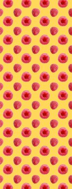 Kusursuz yemek. Sarı arka planda taze ahududu meyveleri.