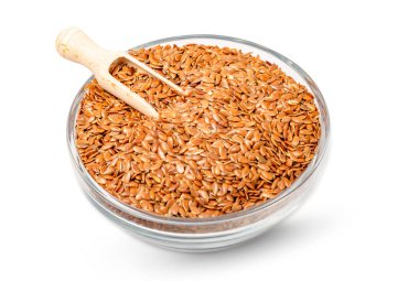 İzole tohumlar. Keten tohumu kasesini kepçeyle kapat. Yüksek mineral içeriği, yumuşatıcı ve koruyucu özellikler.