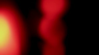 Arkaplanda renkli, bulanık, soyut, hareket eden ışık noktaları