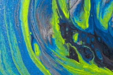 Dökülen boyanın soyut renkli arkaplanı yakın plan