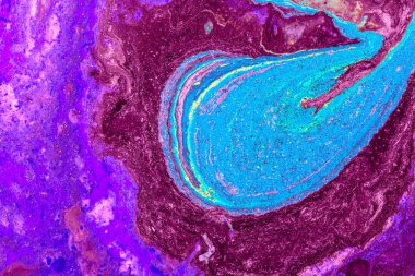 Dökülen boyanın soyut renkli arkaplanı yakın plan