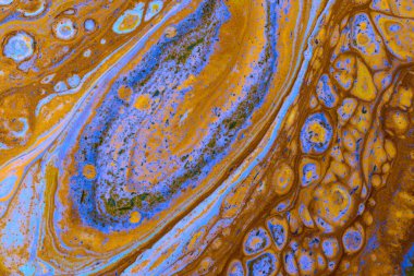 Dökülen boyanın soyut renkli arkaplanı yakın plan