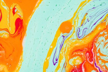 Dökülen boyanın soyut renkli arkaplanı yakın plan