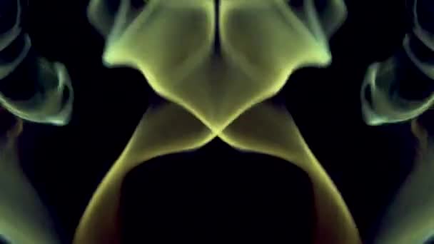 Symmetriskt rörlig färgad rök på en svart bakgrund. — Stockvideo