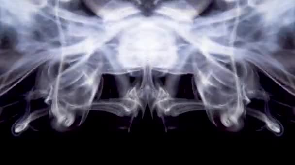 Symmetrically moving colored smoke on a black background. — Stock Video