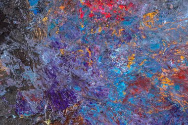 Çok renkli boya lekelerinin soyut arkaplanı.
