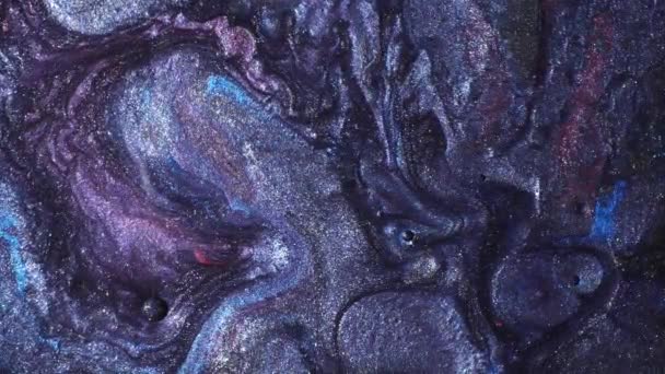 Abstraktní pozadí z pestrobarevných pohyblivých tekutých barev. Natáčení maker — Stock video