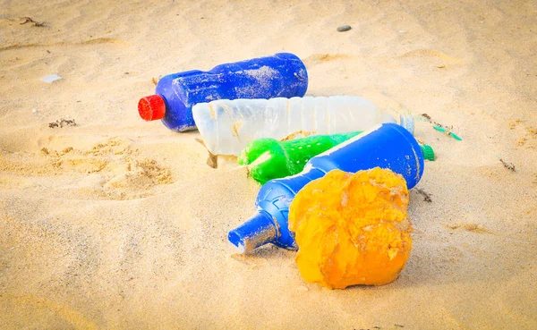 Pollution concept with plastic bottles — Stock Photo, Image