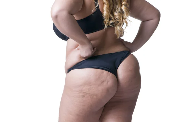 Plus Size Model in schwarzer Dessous, übergewichtiger weiblicher Körper, dicke Frau mit Cellulitis am Gesäß isoliert auf weißem Hintergrund — Stockfoto