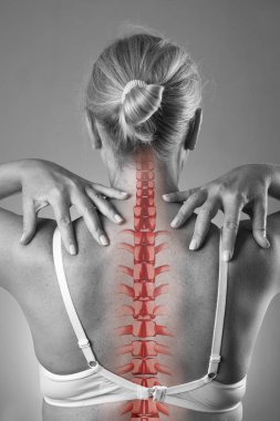 Spine pain, woman with backache and ache in the neck, black and white photo with red backbone clipart