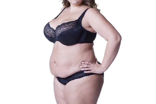 Plus size model in black lingerie, overweight female body, fat woman with stretch marks isolated on white background — Stock Photo, Image