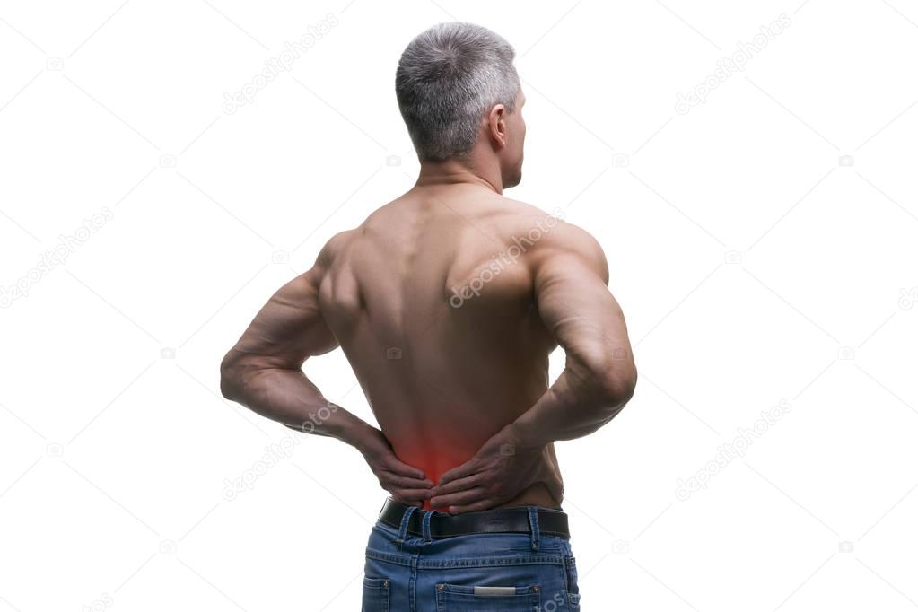 Middle aged man with back pain, muscular male body, studio isolated shot on white background