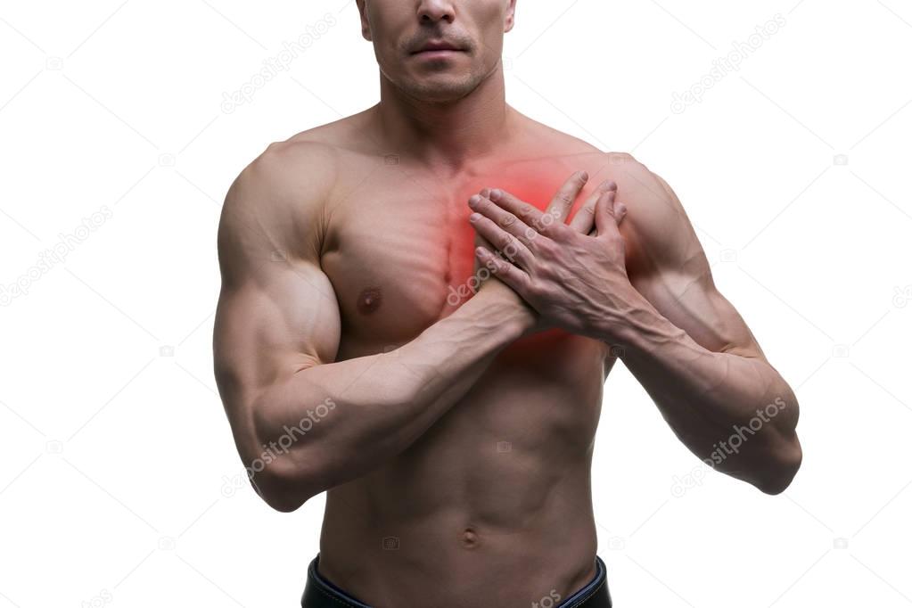 Heart attack, middle aged muscular man with chest pain isolated on white background