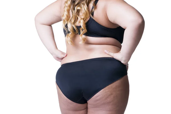 Модель плюс розмір в чорній білизні, надмірна вага жіночого тіла, товста жінка з целюлітом на стегнах, ізольована на білому тлі — стокове фото
