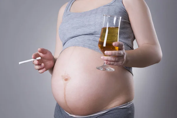 Pregnant woman, alcoholism and smoking, unhealthy lifestyle