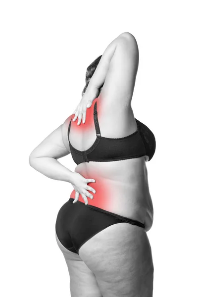 Rücken- und Nackenschmerzen, dicke Frau mit Rückenschmerzen, übergewichtiger weiblicher Körper isoliert auf weißem Hintergrund — Stockfoto