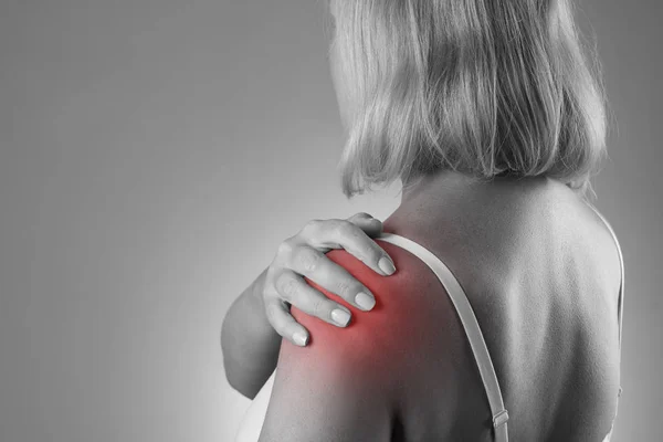 Pain in shoulder, care of female hands, ache in woman's body — Stock Photo, Image