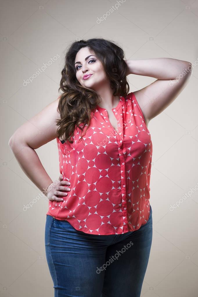 Plus size fashion model in casual clothes, fat woman on studio ...