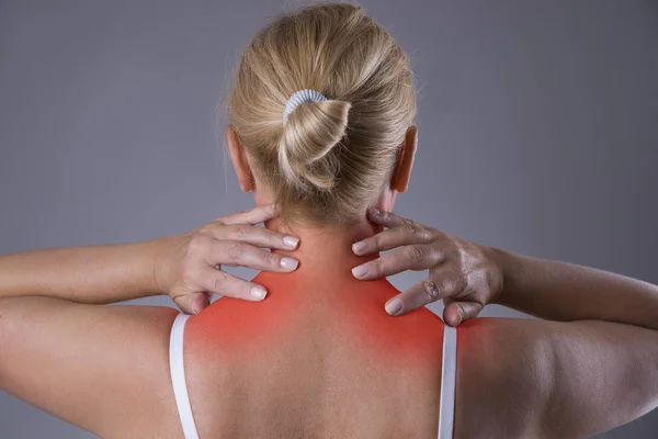 Neck pain, massage of female body, ache in woman's body — Stock Image Neck pain, massage of female body, ache in woman's body Royalty Free Stock Photos